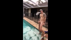 Married hunk jerks off over the pool while smoking