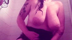 Busty curly brunette with big boobs fucks on couch