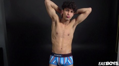 Curly twink boy shows off his slim body on webcam