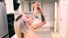 Big-Titted Blonde Babe Plays with Dildo on Webcam