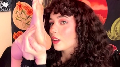 Tattooed busty brunette with foot fetish does hot footjob